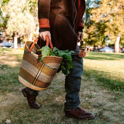 Man with Shopping Tote Bolga Basket in nature