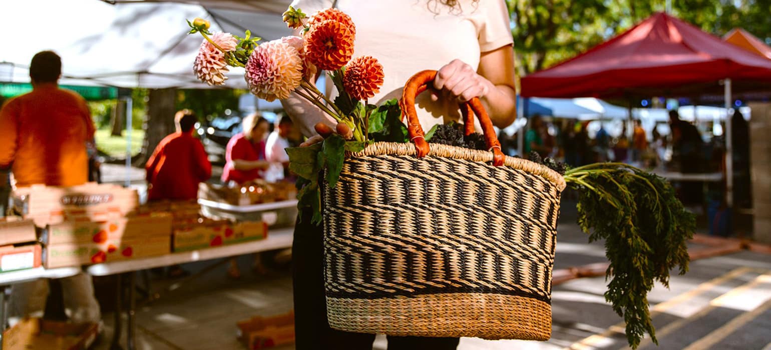 market-basket-flowers-slide Woman in a Market with an African Basket